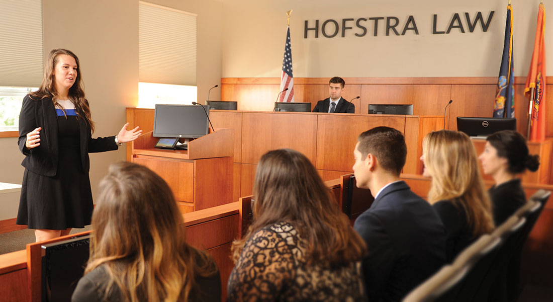 Law Students Working Together in the Moot Courtroom on Campus