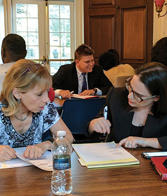 Law students assisting the community at a law clinic session