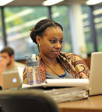 Student Studying in the Law Library