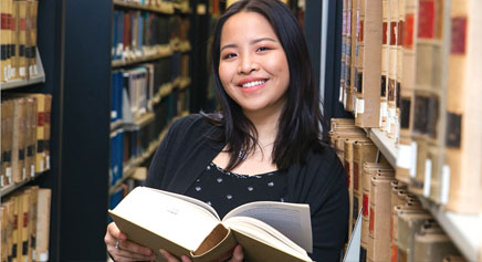 Paralegal student studying in the law library